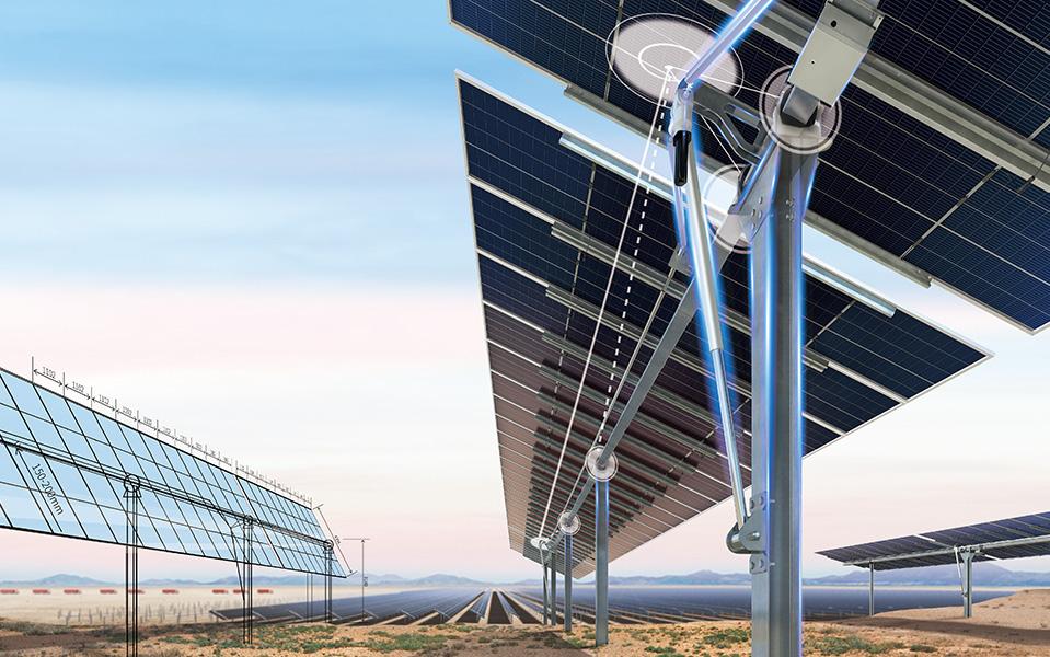 Ground-level view of solar panel installation with mountains and sky in background